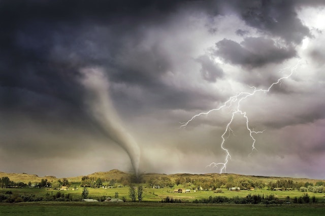 Source: Photo by Ralph W. lambrecht: https://www.pexels.com/photo/lightning-and-tornado-hitting-village-1446076/